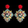 Mouchkine Jewelry haute couture handmade cross and sheep earrings.
