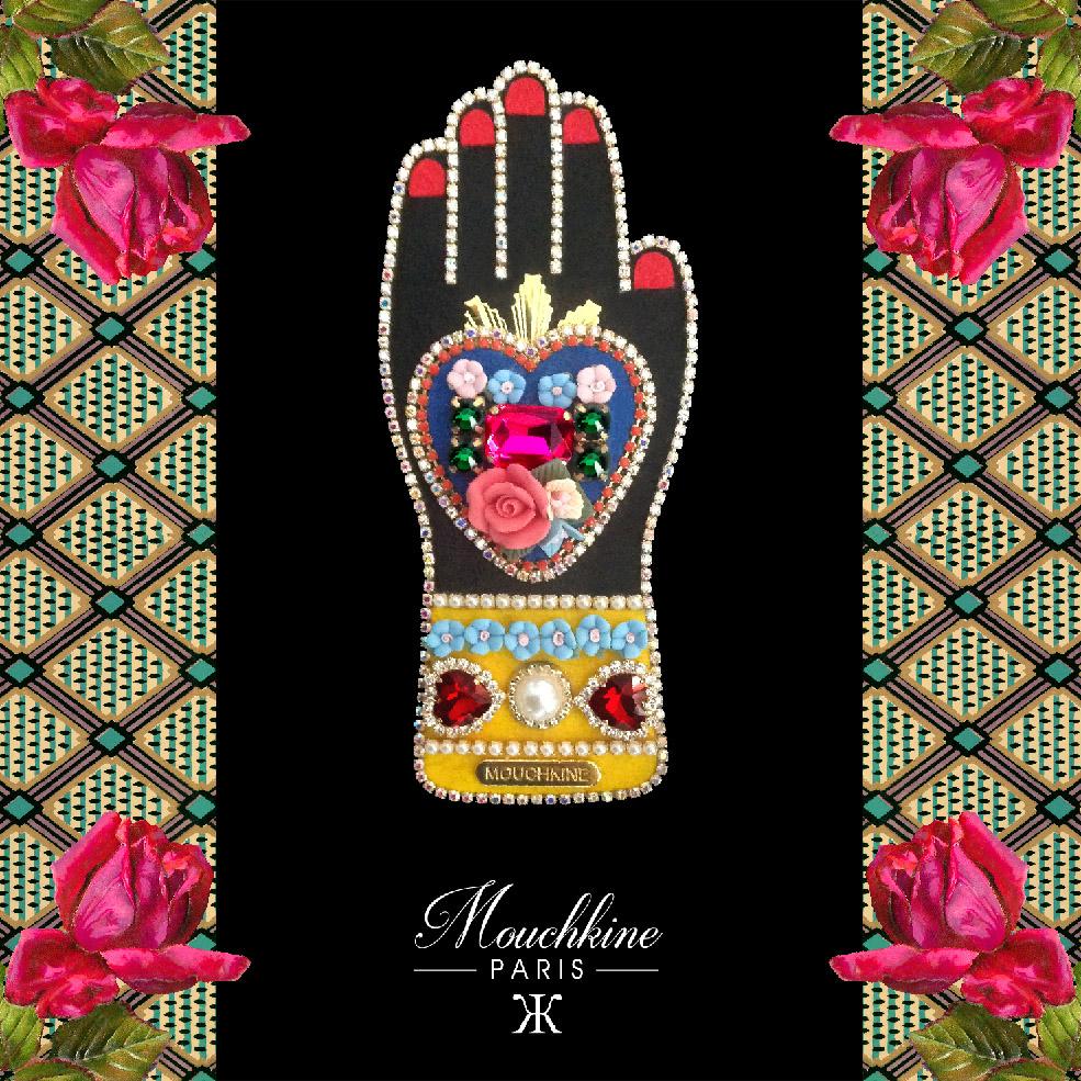 mouchkine jewelry haute couture brooch : a sublime hand with a heart full of flowers and rhinestones