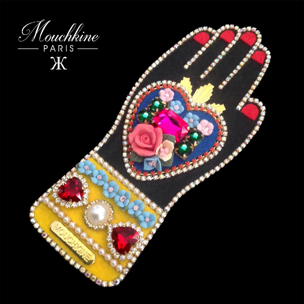 mouchkine jewelry haute couture brooch : a sublime hand with a heart full of flowers and rhinestones