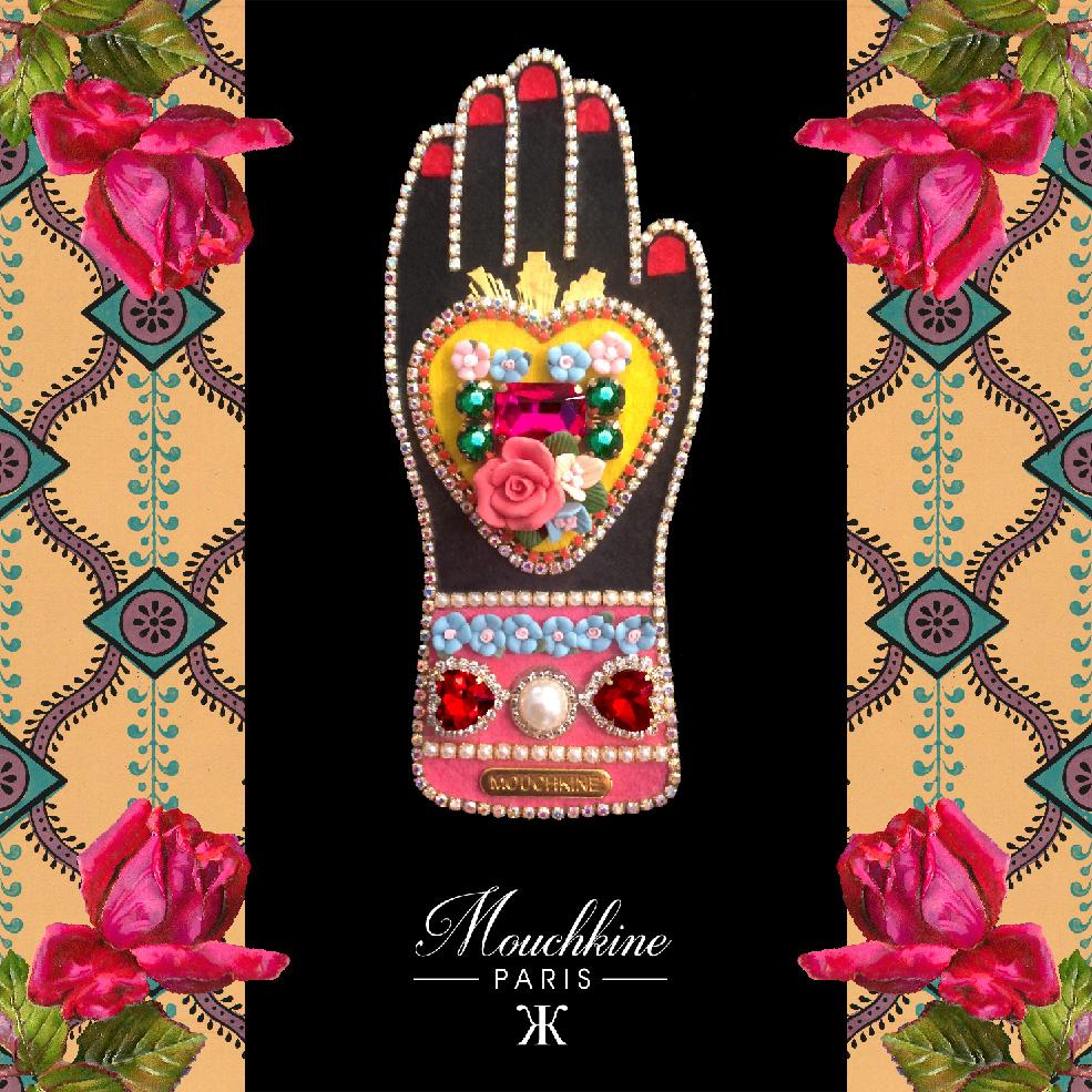 mouchkine jewelry haute couture brooch : a sublime hand with a heart full of flowers and rhinestones