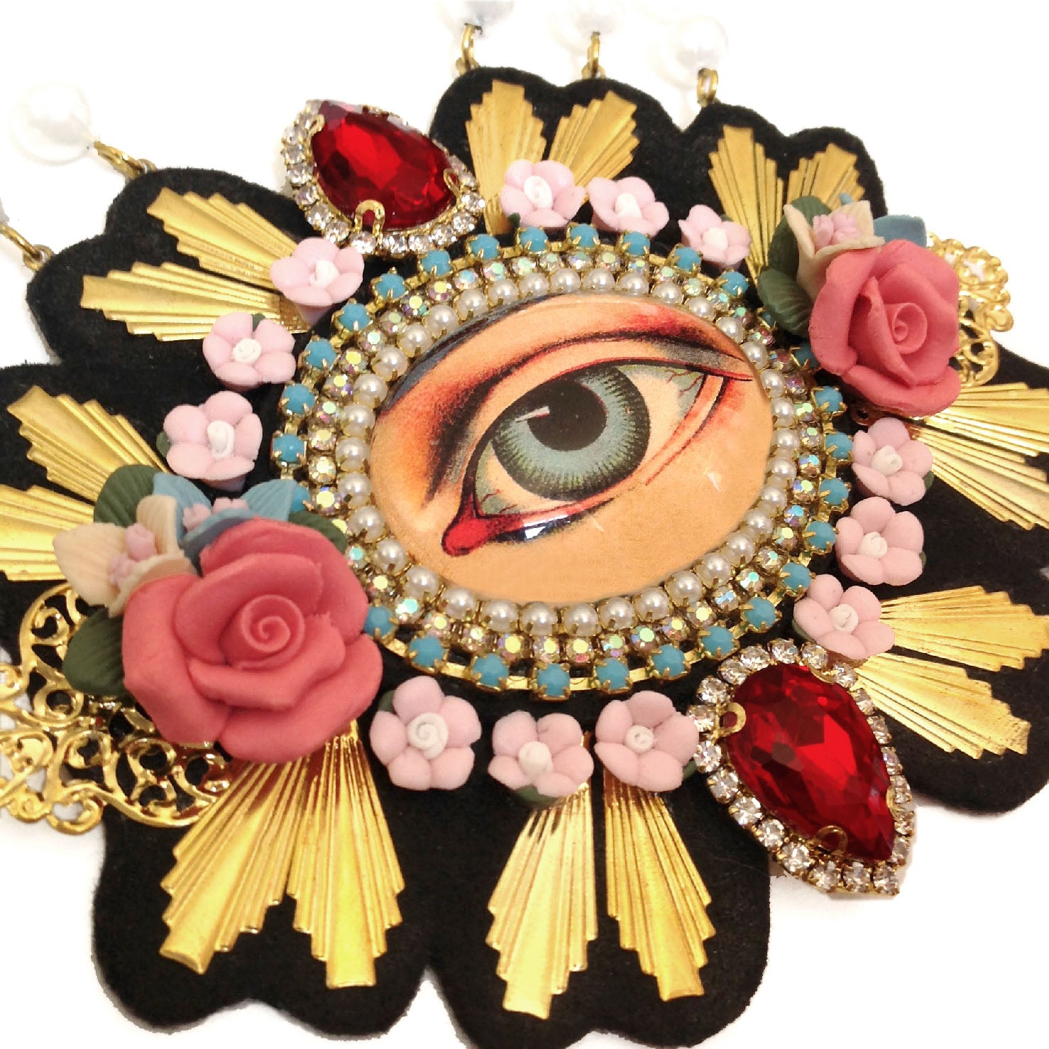 mouchkine jewelry detail of haute couture eye necklace